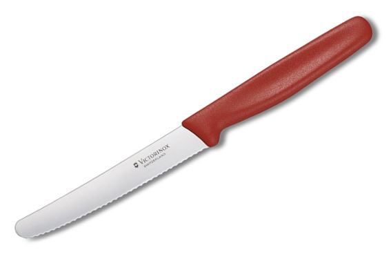 Couteau à viande avec bord ondulé et bout rond avec poignée rouge